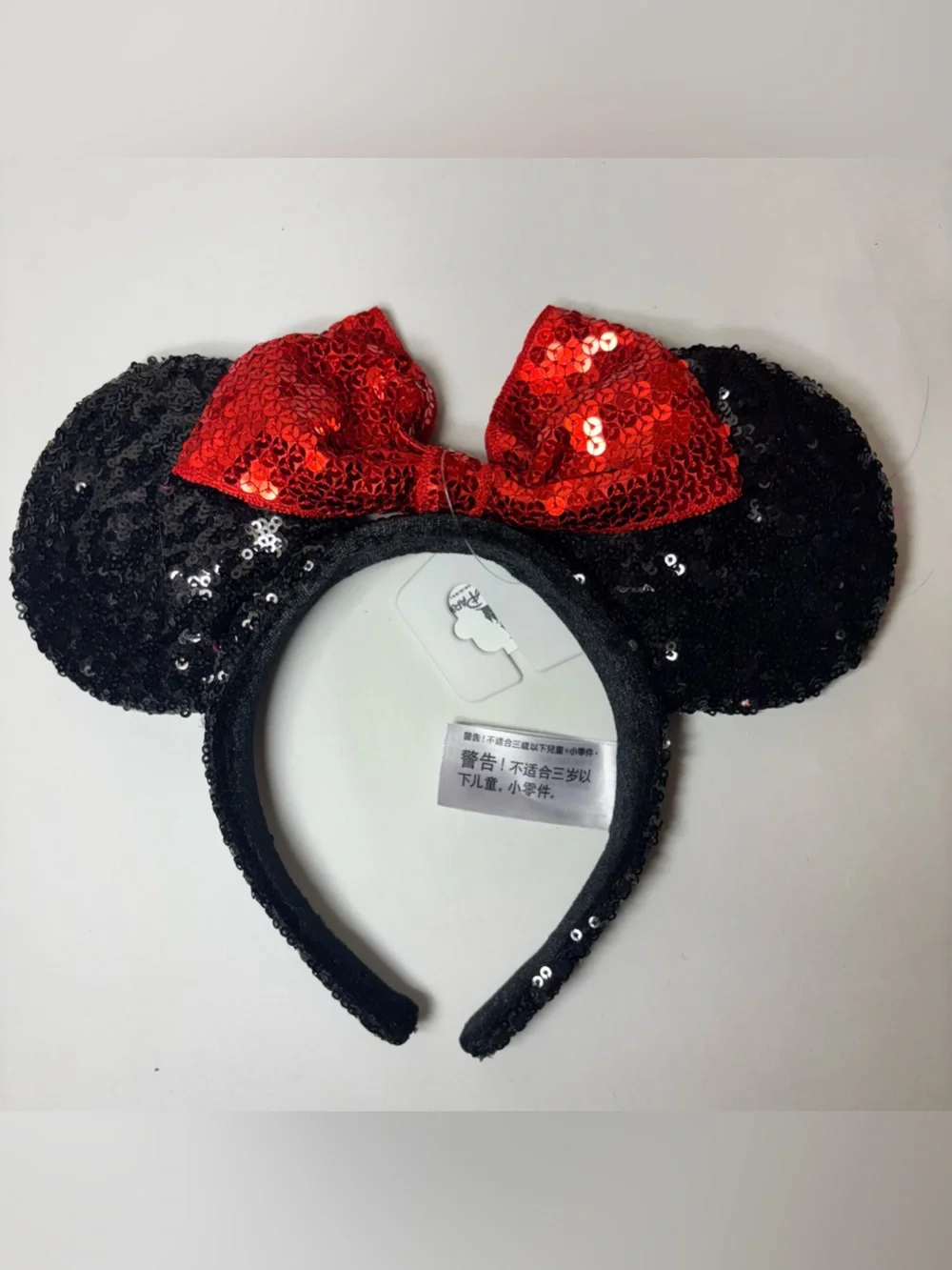 Official Disney Parks Sequin Minnie Mouse Ear Headband with Red Bow